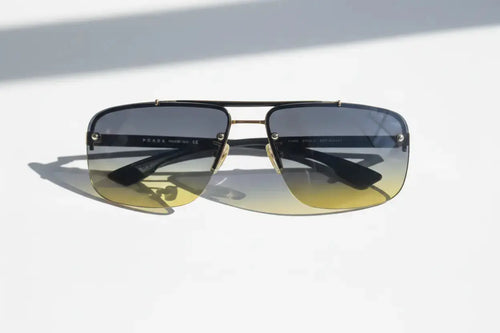Prada Aviator Sunglasses – Gold Frame & Dark Gradient Lenses Prada